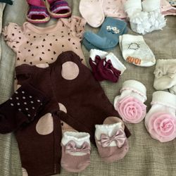 lot of newborn- 3 month baby clothes/ many never used 