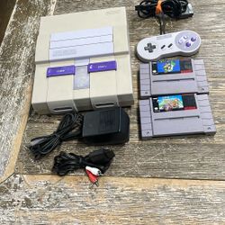 Super Nintendo Console With 2 Games $240