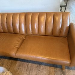 Couch and table with chairs