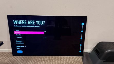 LG 65” OLED 4K Smart TV + TV Stand + Remote – $300