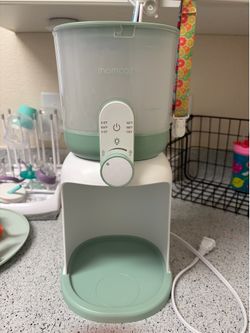 Momcozy water warmer for formula feeding mamas