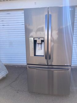 Refrigerado LG Fresh Door de acero inoxidable en buenas condiciones limpio y agradable un mes de garantía entrega disponible dimensiones W36-D27-H69