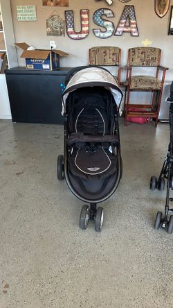 Black stroller three wheel