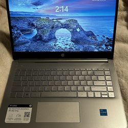 Selling Hp laptop, silver color, intel core i3