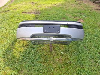 Front bumper assembly. I believe it is from a 2008 chevy impala, but I could be wrong .  It is all there . Trim is in good shape. First $40 and it's y