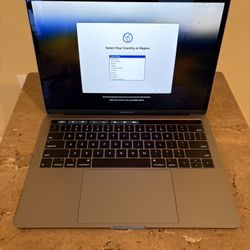2019/20 MacBook Pro 13 Touchbar 1.4Ghz i5 8GB Memory 128GB Storage (Like New Original Charger)