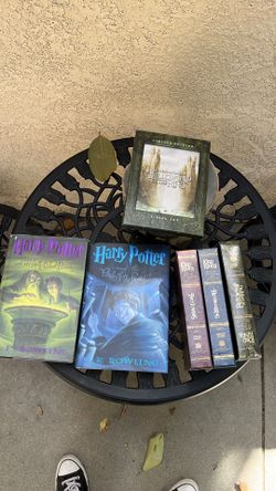 Two Harry Potter books and Lord of the rings DVD ollection