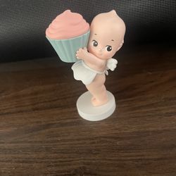 kewpie holding things for trade
