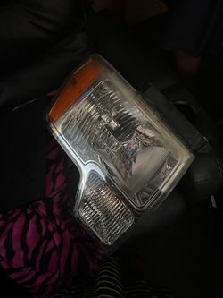 09 Ford F150 OEM right headlight