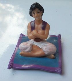 Disney Figurine, ALADDIN Sitting On Magic Carpet, PVC Toy by Sasco Inc