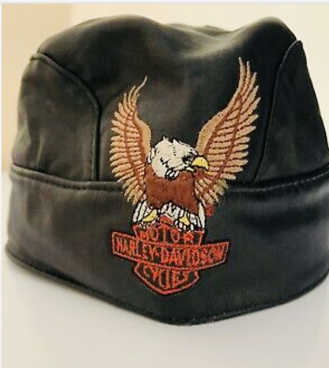 Harley Davidson Genuine Leather Skull Cap and a Vintage 1999 Black Harley Davidson Motorcycle Helm et With Visor 