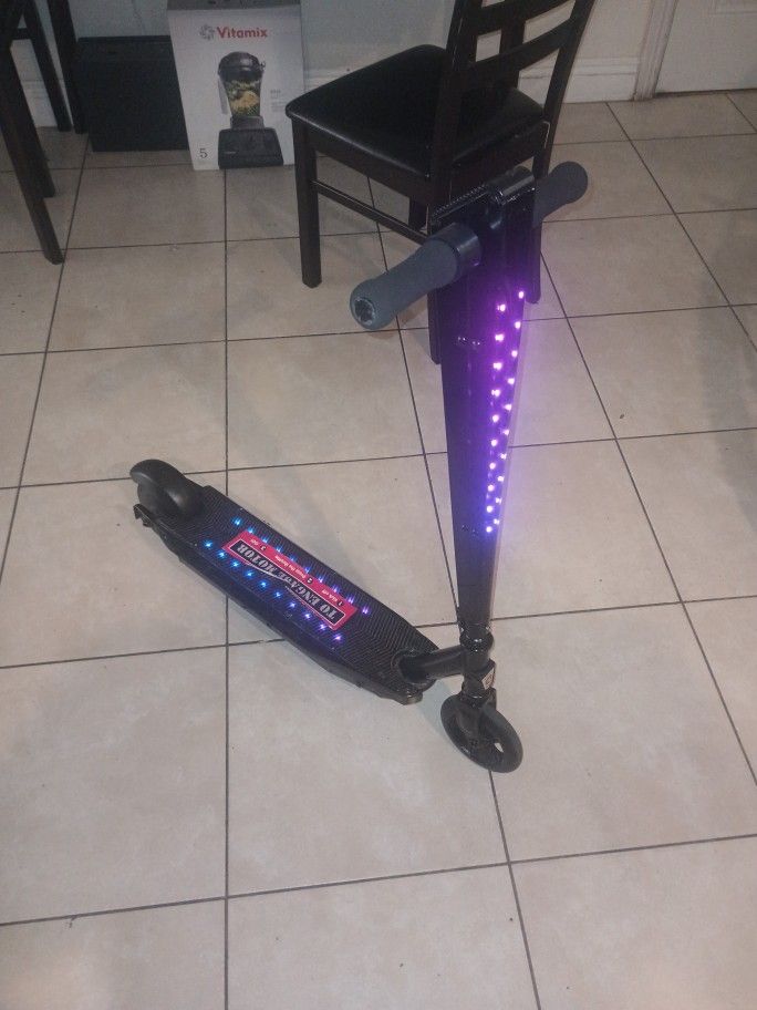 Electric Scooter With Bluetooth Speaker