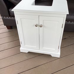 Pedestal sink storage cabinet