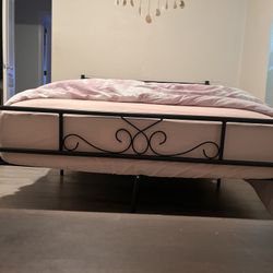 Full-size wrought iron bed frame for sale