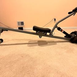 Sunny Health & Fitness Compact Adjustable Rowing Machine with 12 Levels of Adjustable Resistance