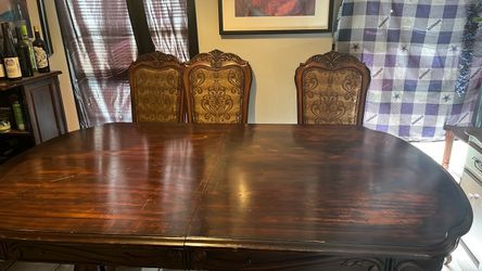 Dining room table with five chairs