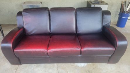 Burgundy/red vinyl couch with Lazy Boy Office Chair