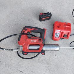 Milwaukee  Grease Gun Battery And Charger 