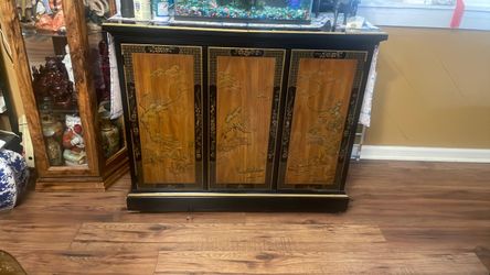 Asian Carved Wood Cabinet with Black Lacquer Frame