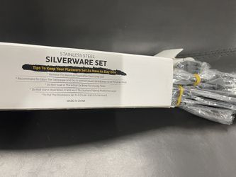 Unopened 20 piece black silverware set