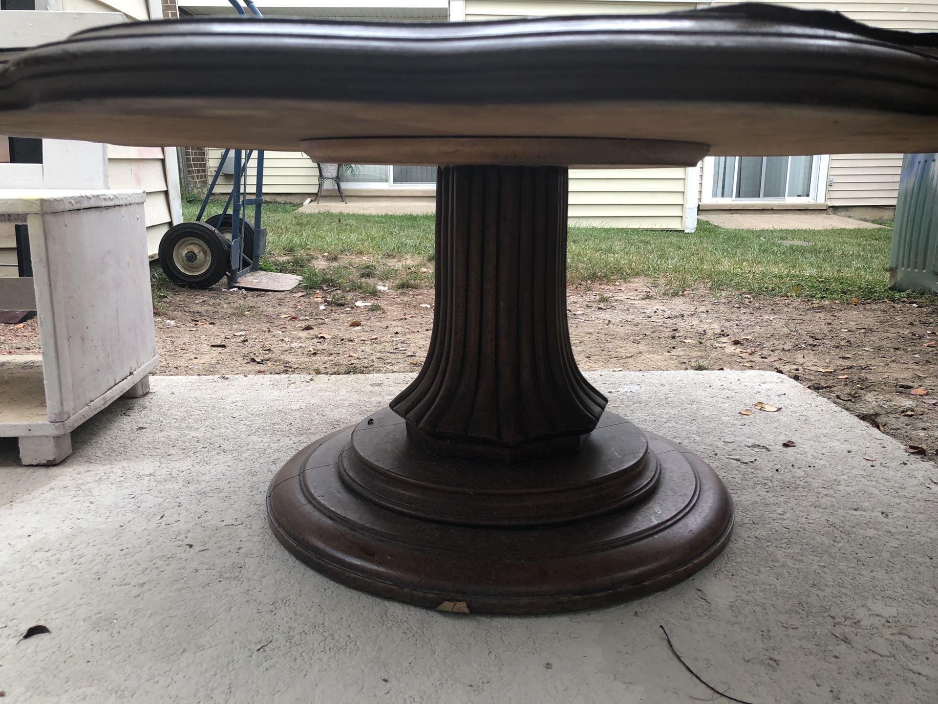 Brown antique uniquely shaped table