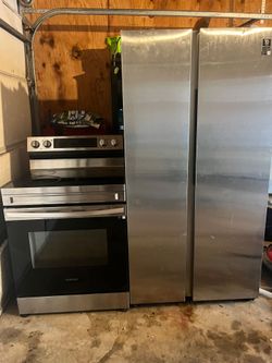 Samsung refrigerator side by side and stove set both are electric