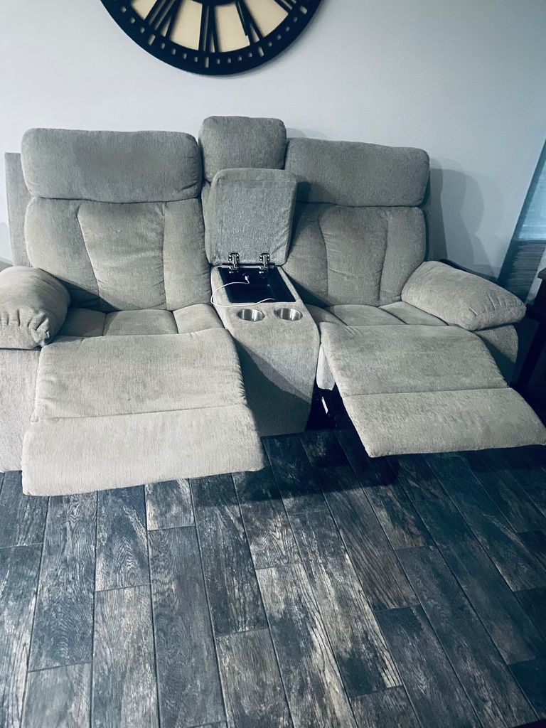 A Couch And Two Side Tables 