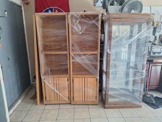 Entertainment unit and glass display cabinet