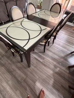 Glass dining table with 6 chairs
