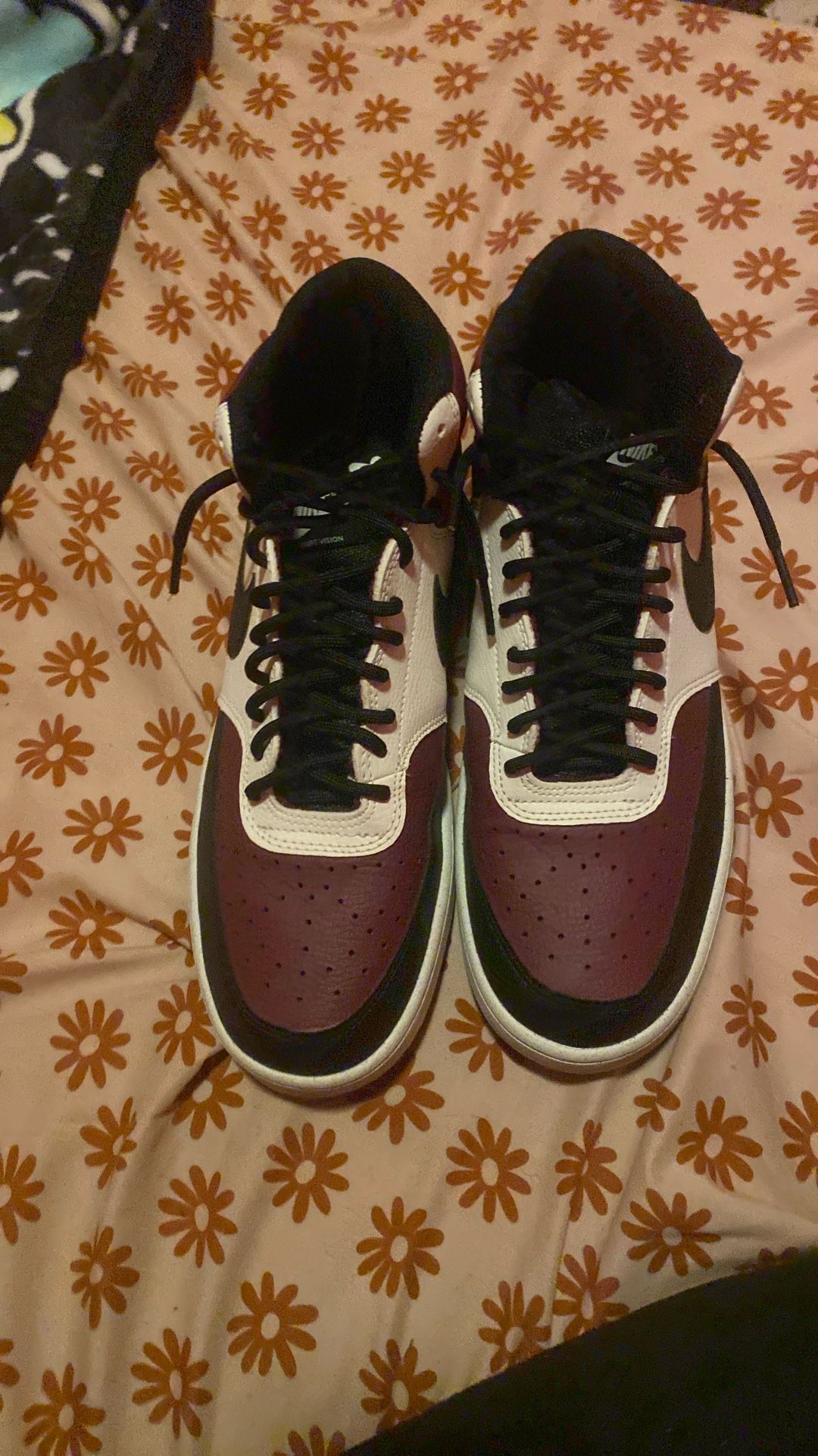 Nike Court Vision Mid Next Nature shoes in a burgundy and black colorway