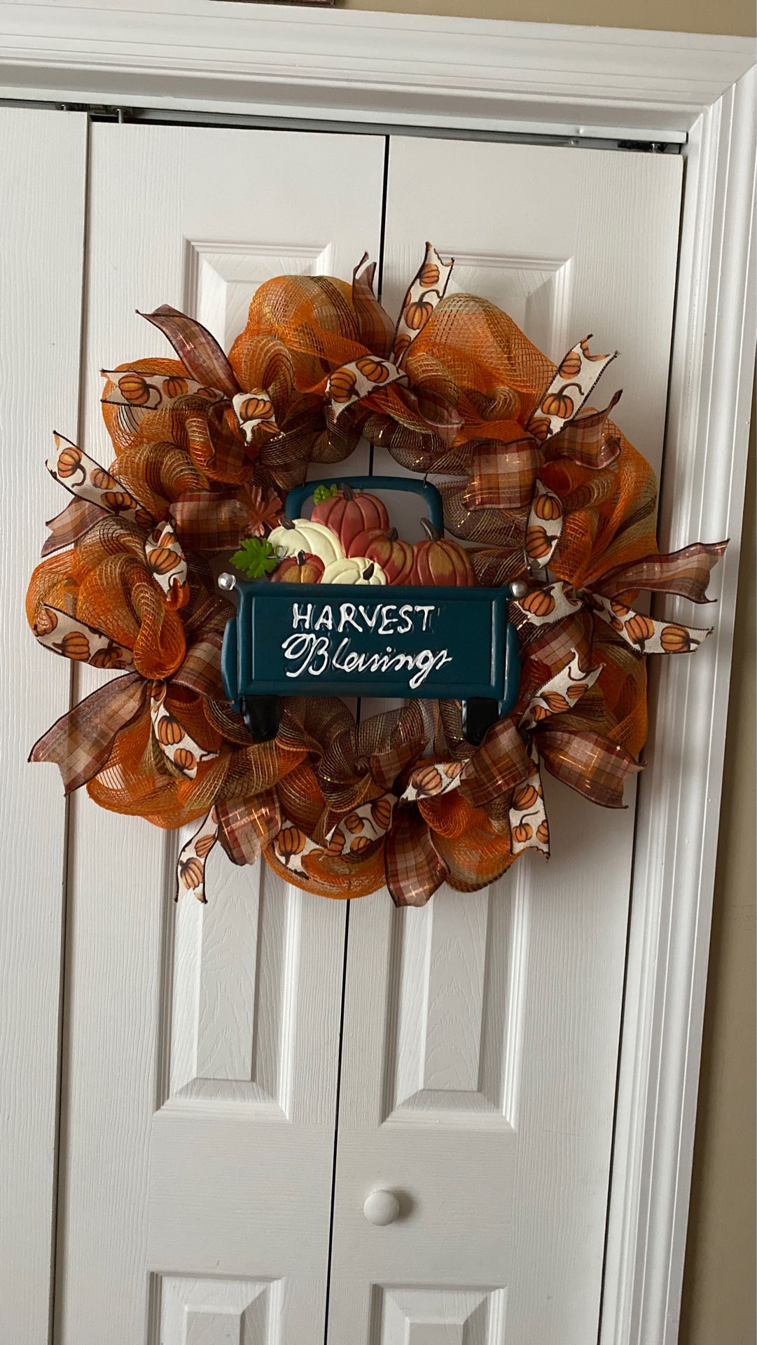 Fall wreath on an 18 in. Wire frame finished size is 24 ins.