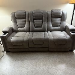 Gray Dual Reclining Sofa And Matching Loveseat 