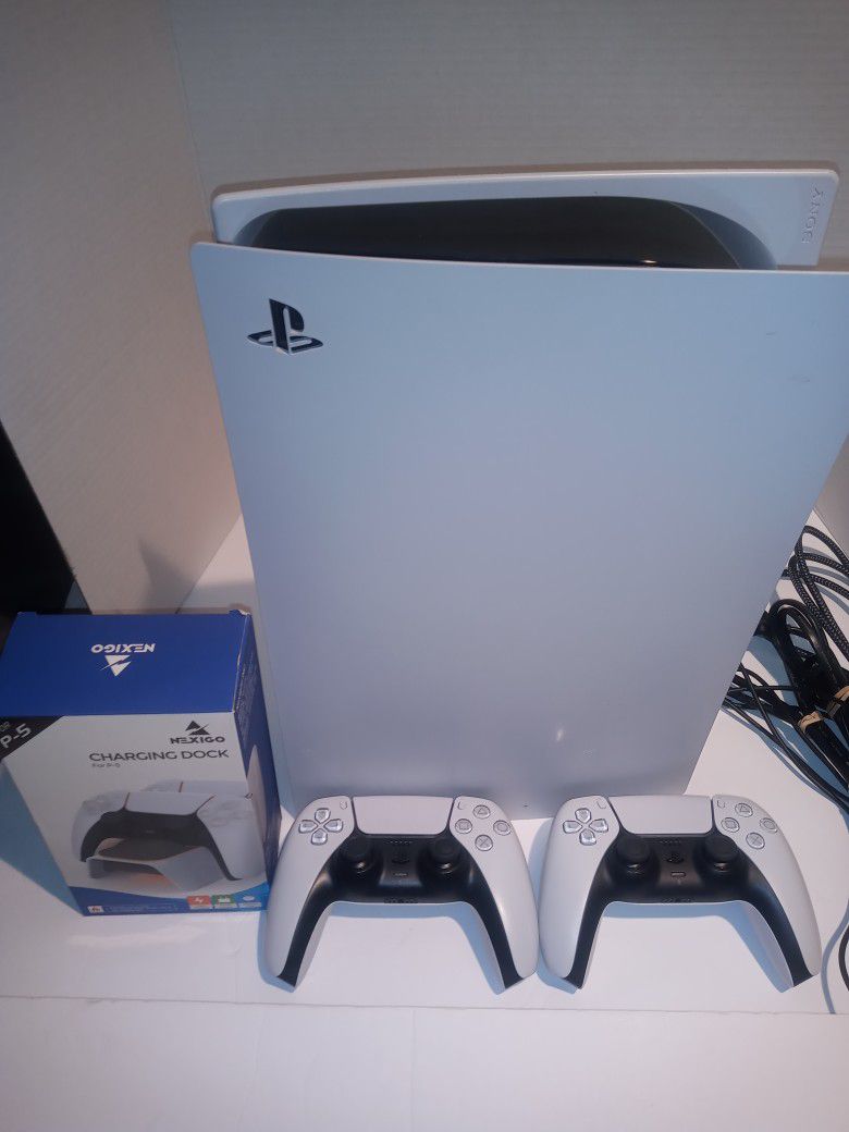 Banned PlayStation 5 digital console.  \w two controllers and controller charger