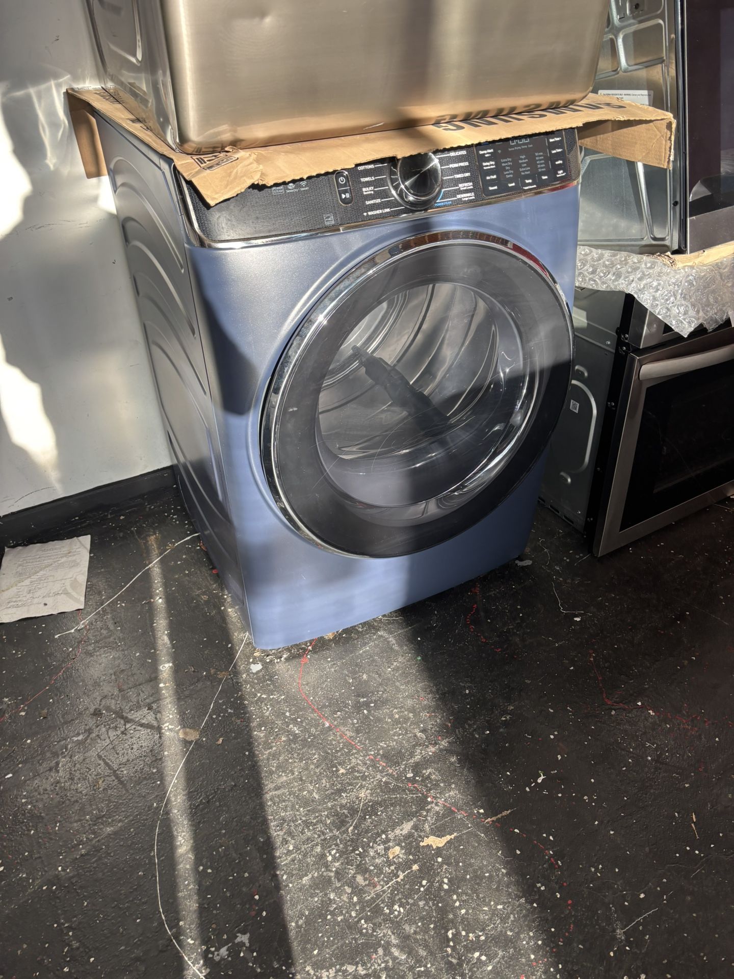 New GE Profile - 7.8 Cu. Ft. Stackable Smart Electric Dryer with Steam and Sanitize Cycle