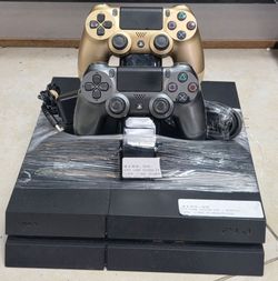 Sony PS4 Console with 2 DualShock Controllers