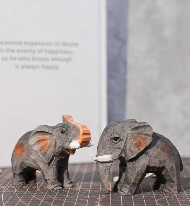 Two elephant ornaments