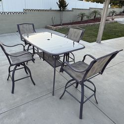 Patio Set (Table, 4 Swivel Chairs and umbrella stand)