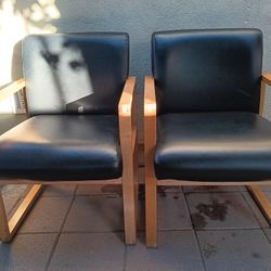 2 Wood Frame Office Chairs with Black Upholstered Faux Leather 