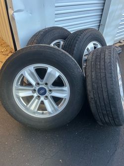 OEM Ford rims and tires P235/70R17