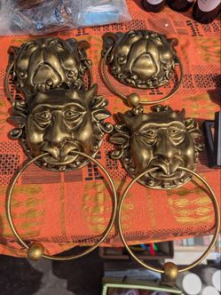 The labyrinth door headknockers