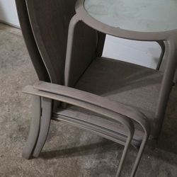 2 patio chairs and side table