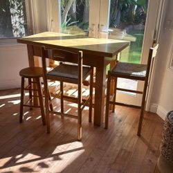 Solid wood table and wine rack with three chairs
