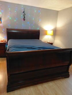 Dark Cherry Wood Sleigh Bed Frame with 2 end tables and dresser