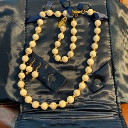 Stauer set, Necklace, Earrings,  and Bracelet in the original packaging. 