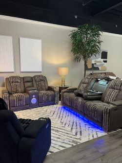 Luxurious look brown plush seating dual power reclining sofa w/theatre experience