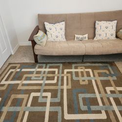 Futon with Area Rug