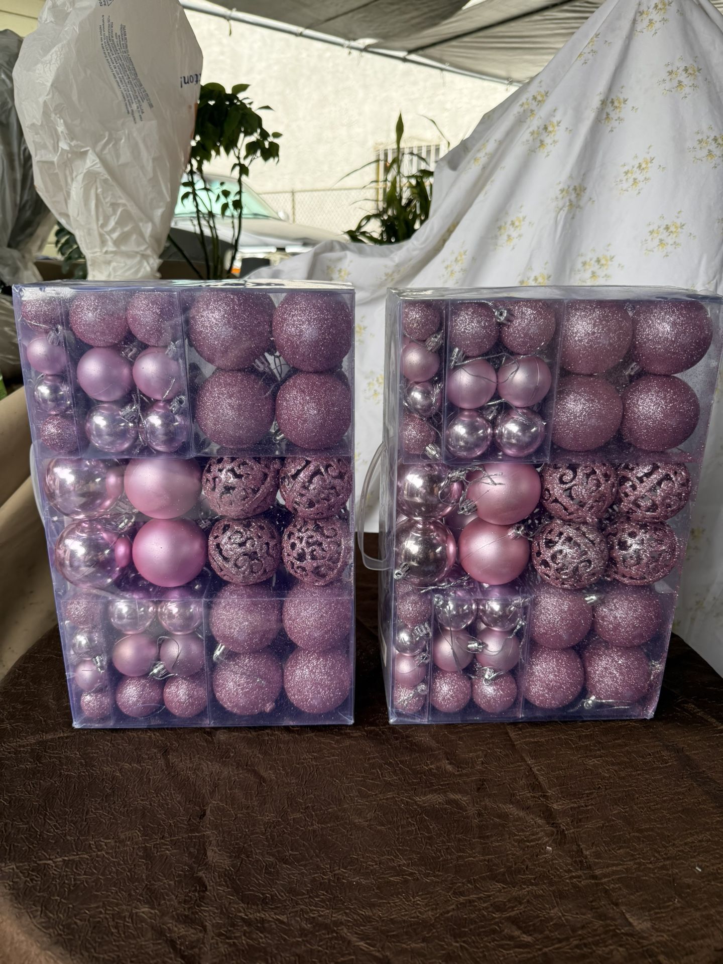 Two Boxes Of Pink Christmas Ornaments