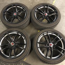 used set of Revolution Racing Rr28 Wheel 18x8  +40 offset 5x114.3 flat Black w/ silver Ring with 235/40/18 Tires