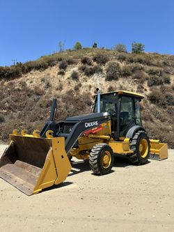 John Deere 210LJ Enclosed Skip Loader 