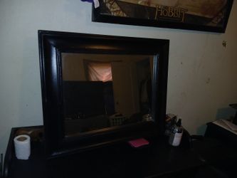 A Nice Black Wooden Mirror